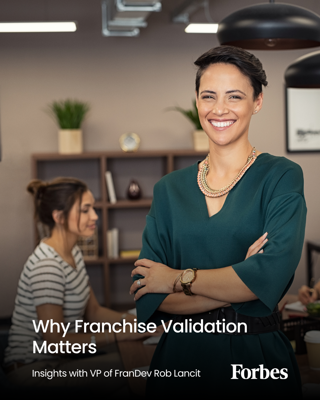 A photo of a woman in an office, smiling towards the camera. The text in the bottom reads: why franchise validation matters, insghts with VP of FranDev rob lancit.
